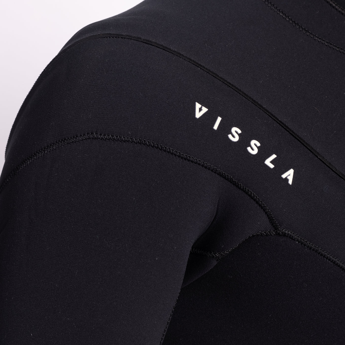 Vissla X Axxe 3-3 wetsuit logo detail
